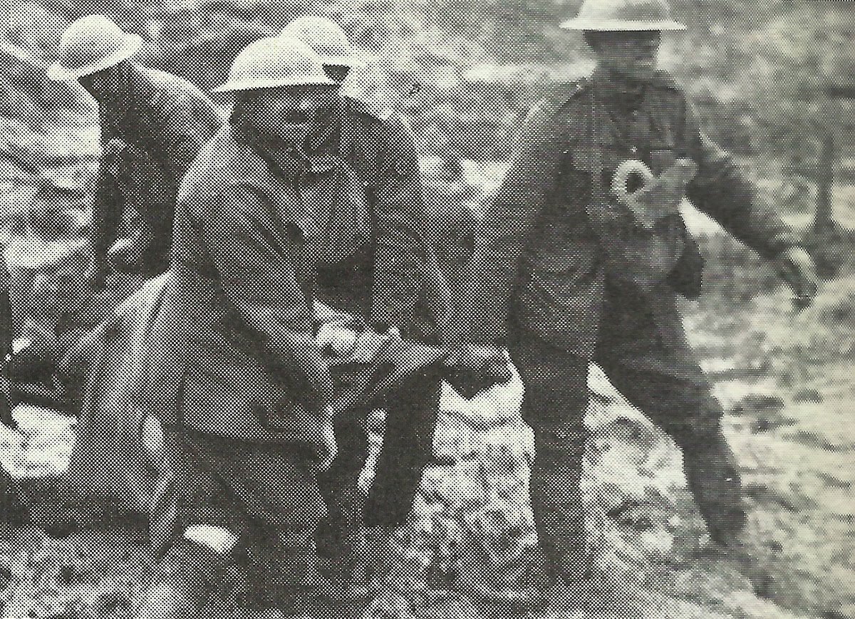 Stretcher-bearers in mud of Ypres