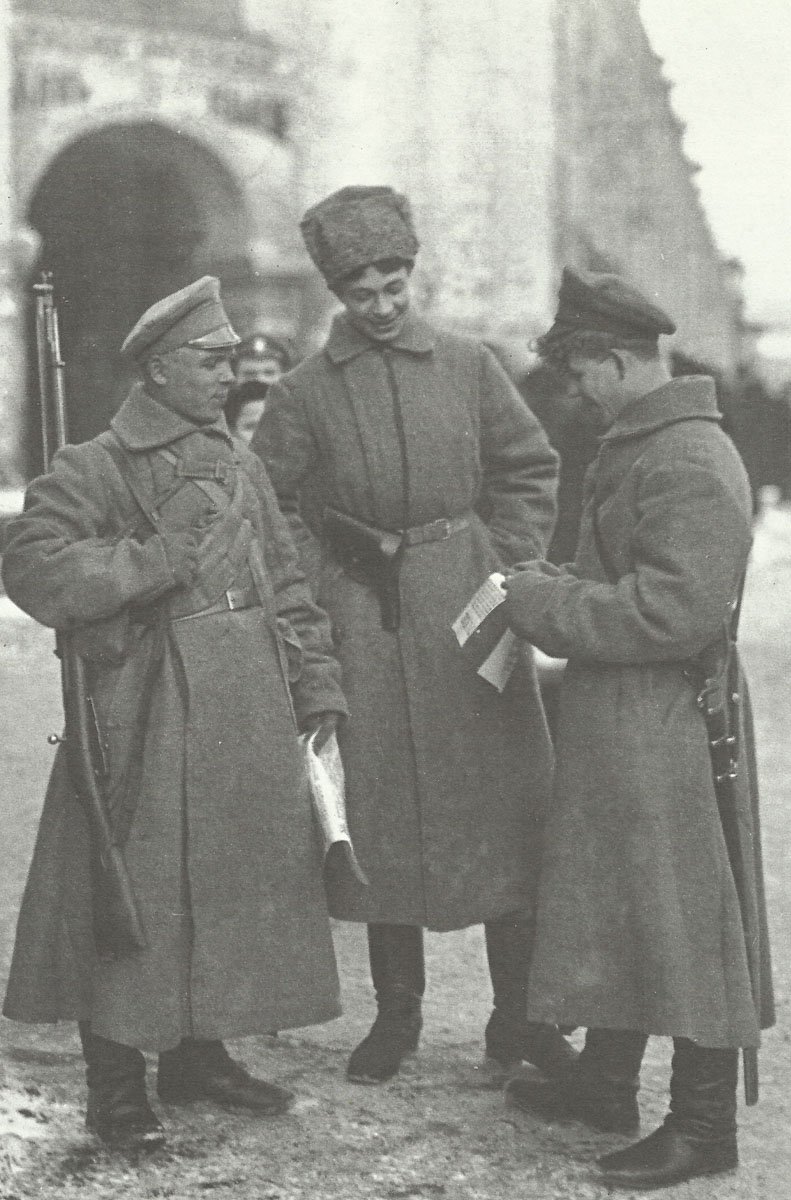 Russian soldiers reading propganda leaflets