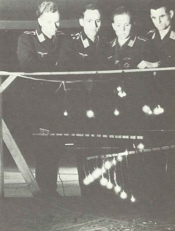 German pathfinder bomber crew exercising on a model of a British city.