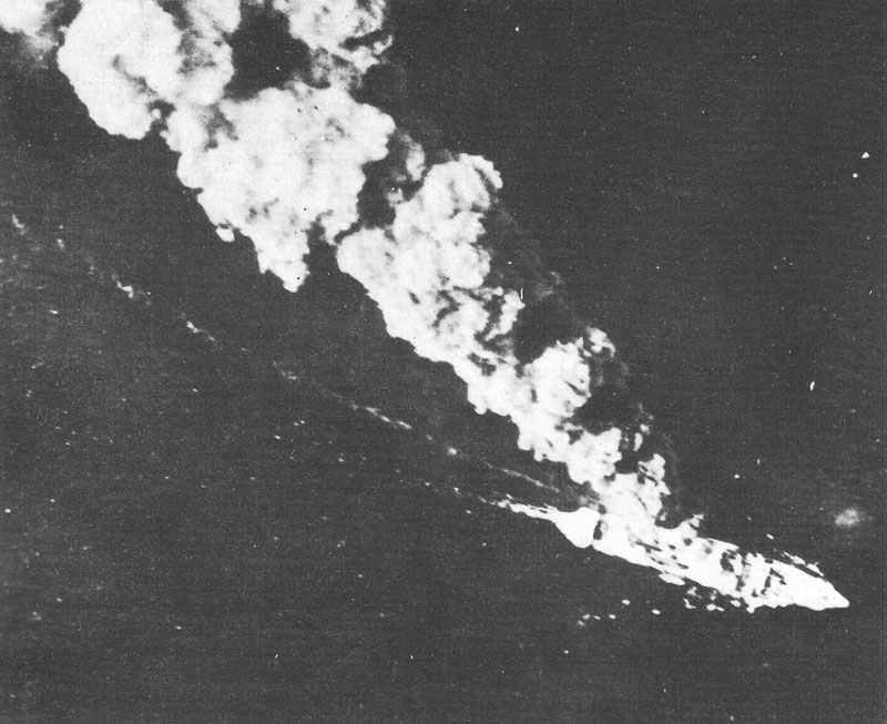 Japanese merchantmen burns in the Bismarck sea