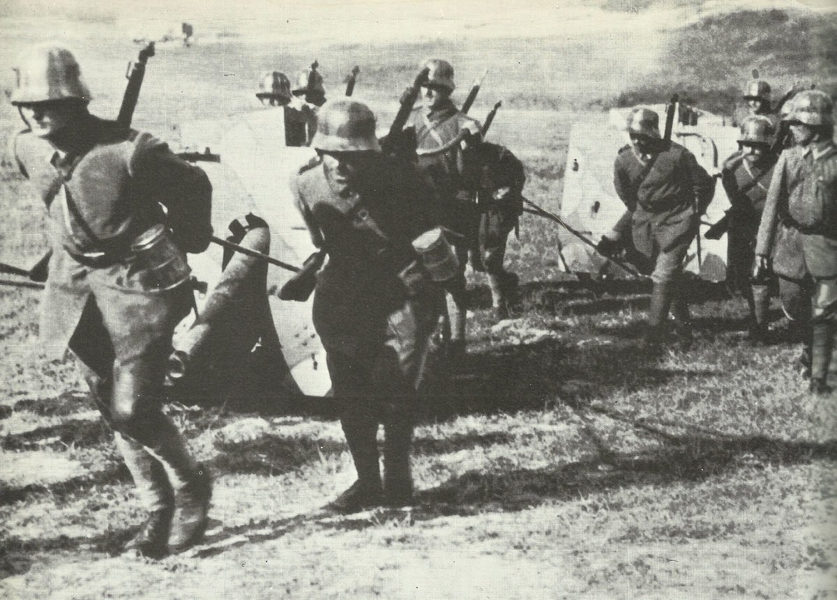 German gunners pull field guns