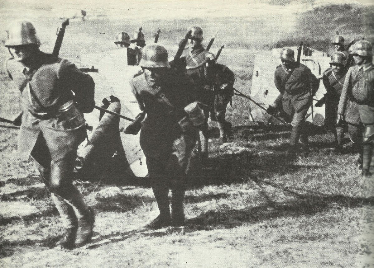 German gunners pull field guns