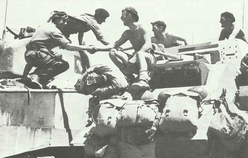 Link up of British First Army Sherman tank and Eight Army Humber