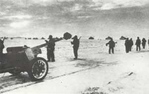 German column of anti-tank guns, infantry and tanks