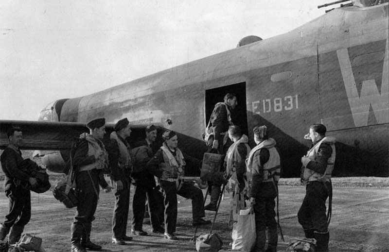 crew of 9th squadron's Lancaster board their aircraft at Bardney, Lincolnshire