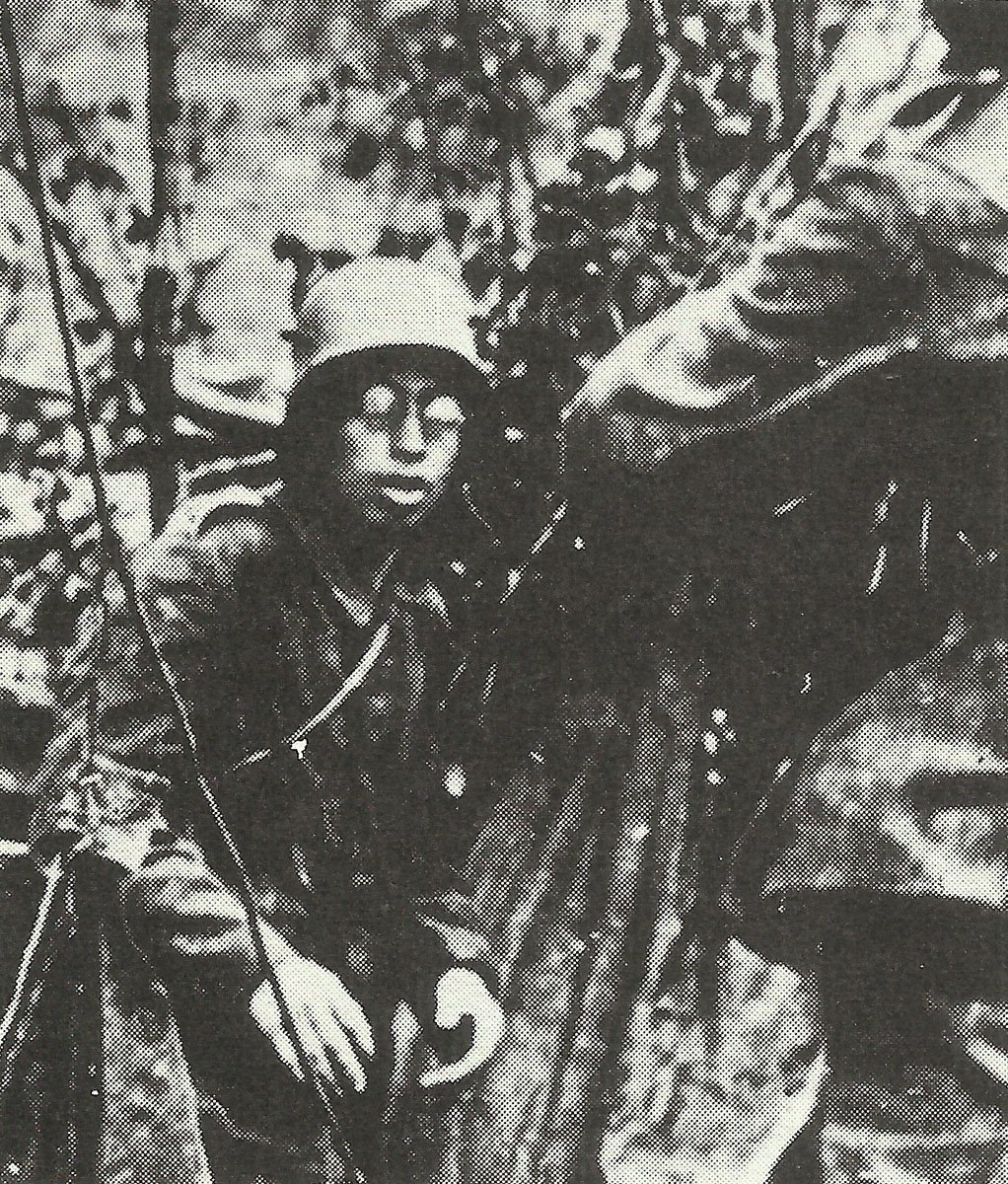 Bespectacled German soldier surrenders