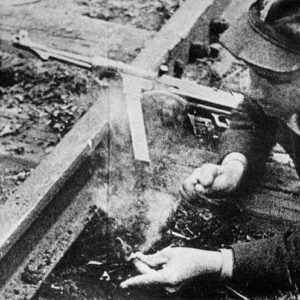 Partisan prepares the blow up of a railroad