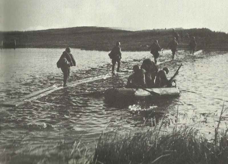 Russian troops crossing the river Dnieper on a simple footbridge