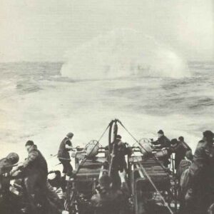 escort ship drops depth charges