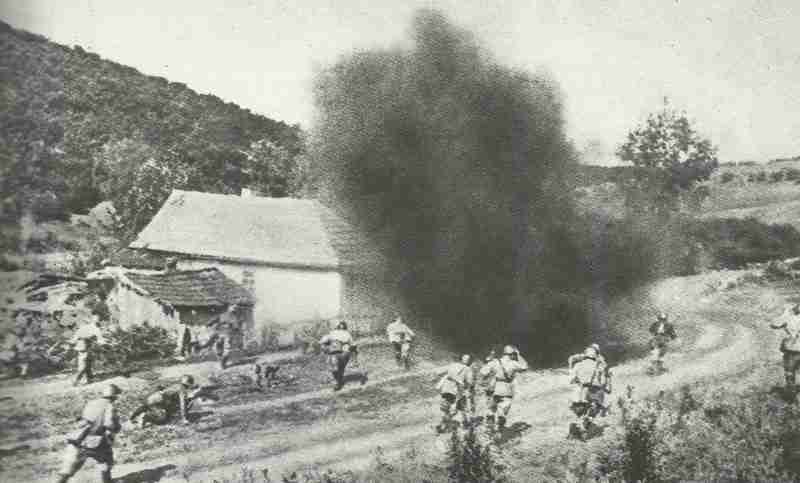 Soviet infantry attack on a fortified group of houses.