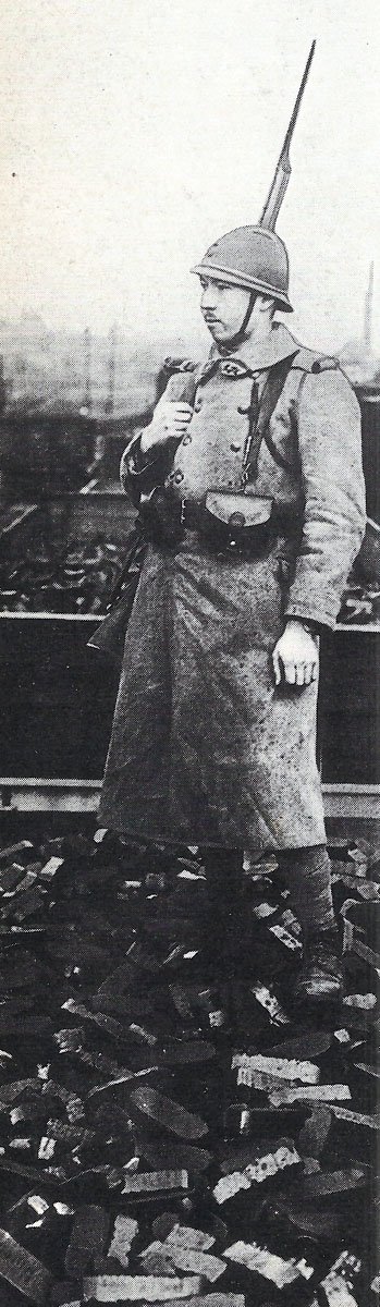 French soldier guards a coal train