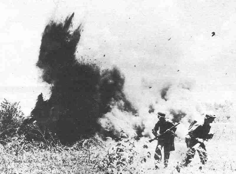 US Marines blow up Japanese dugout on Saipan
