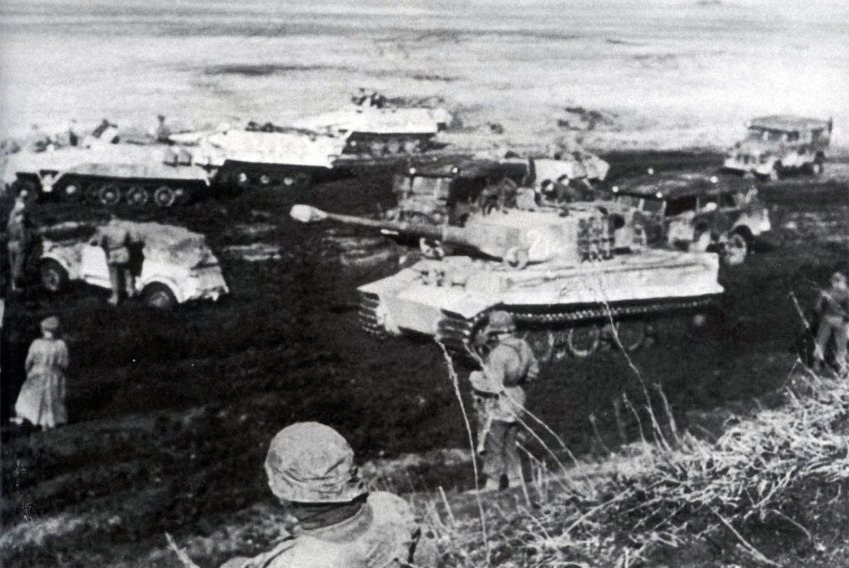 Troops of the 9th and 10th SS Panzer Division with Tiger tanks