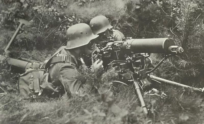 Weapons World War One 41 German machine gunners wearing gas masks.
