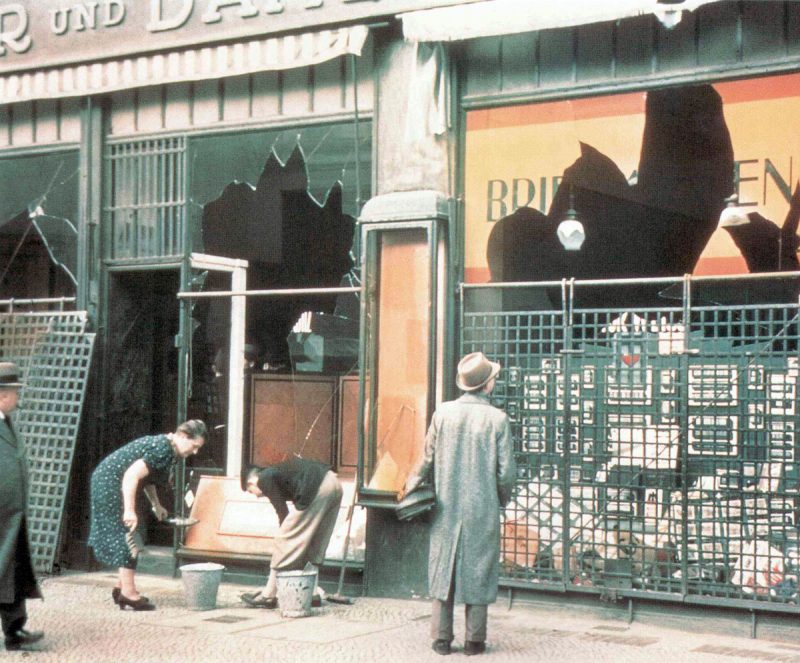 Cleaning up a looted and destroyed store after the 'Reichs-Kristallnacht'.